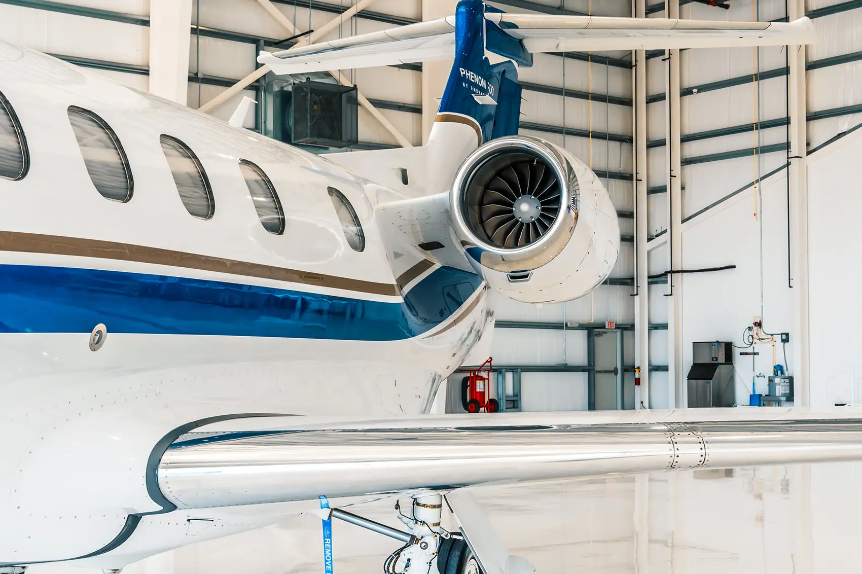 Private jet concierge, jet in hangar
