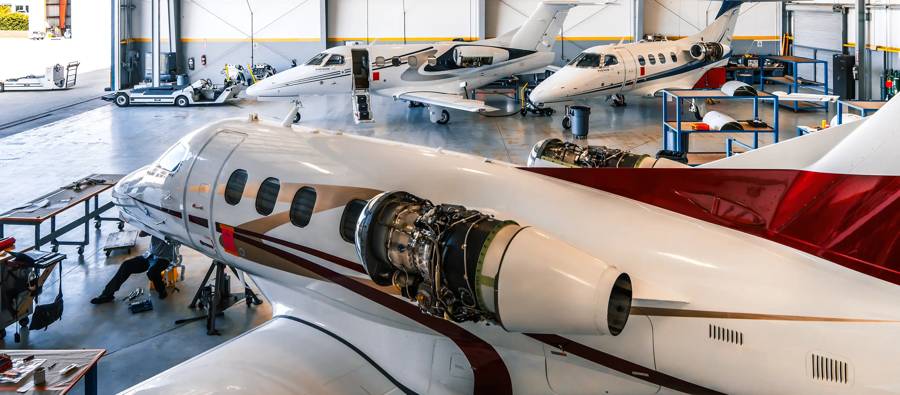 servicing jets in hangar Naples, FL
